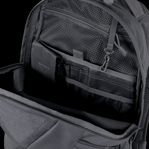 The Condor Elite Fail Safe Urban Backpack Gen II 18L from Condor features a black open design with interior compartments, mesh zip pocket, pen slots, and multiple sections—ideal for everyday carry or trips to the shooting range.